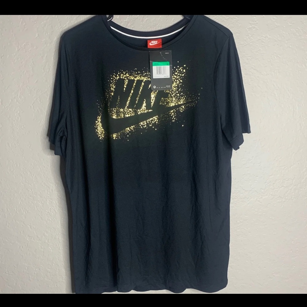 Women's Black and gold Nike T size XL